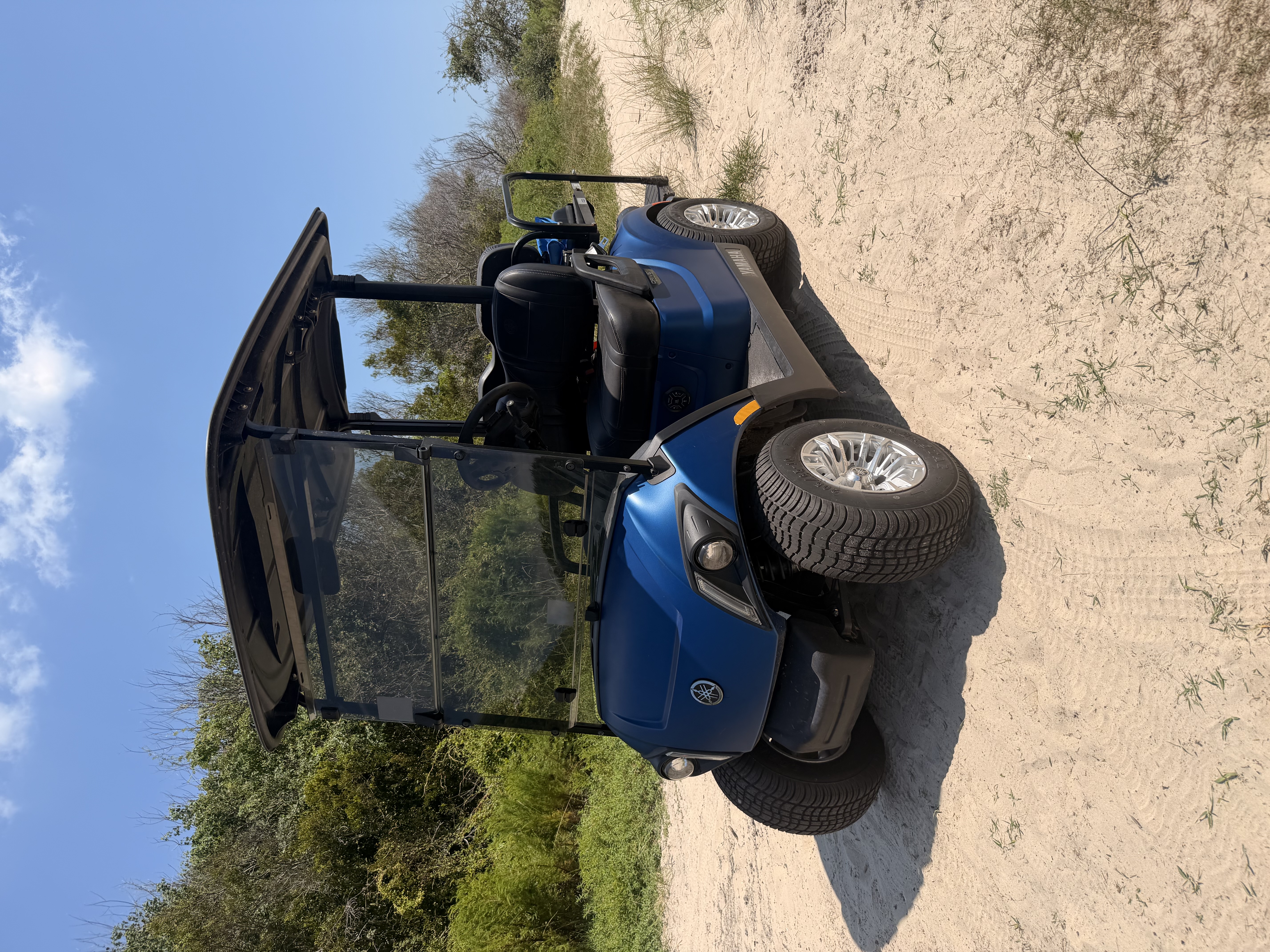 The real blue Yamaha Drive2 rental cart operated by Wavy Rentals